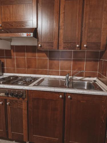 Kuchyň nebo kuchyňský kout v ubytování Apartment HM