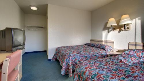 Letto o letti in una camera di Motel 6-Owensboro, KY