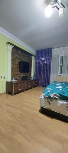 Μια τηλεόραση ή/και κέντρο ψυχαγωγίας στο Apartament