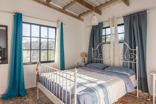 Postel nebo postele na pokoji v ubytování Colonial Suite Constanza
