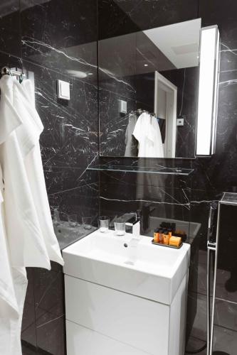 Koupelna v ubytování Hotel Bastian