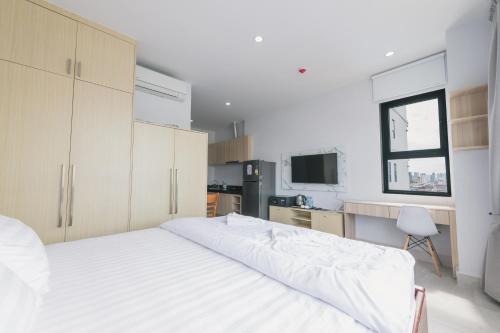 Ένα ή περισσότερα κρεβάτια σε δωμάτιο στο Residence 110 (Hotel and Apartments)