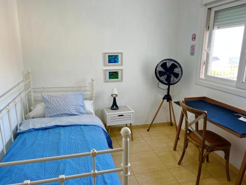 Ένα ή περισσότερα κρεβάτια σε δωμάτιο στο La SELVITA