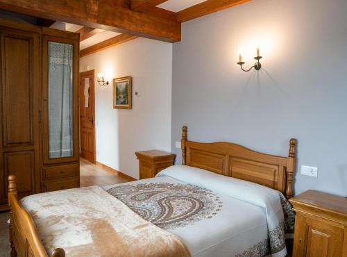 Ліжко або ліжка в номері Casa Rural La Magdalena