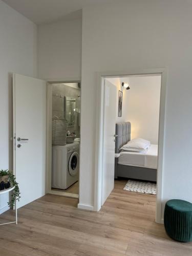 Postel nebo postele na pokoji v ubytování Apartments Antini