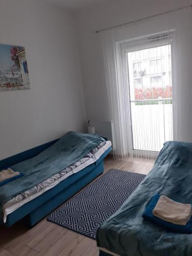 Tempat tidur dalam kamar di Apartament Perła Bałtyku