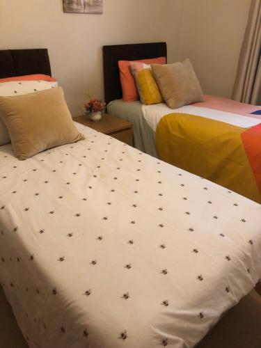 Postel nebo postele na pokoji v ubytování Cute flat in Whitechapel