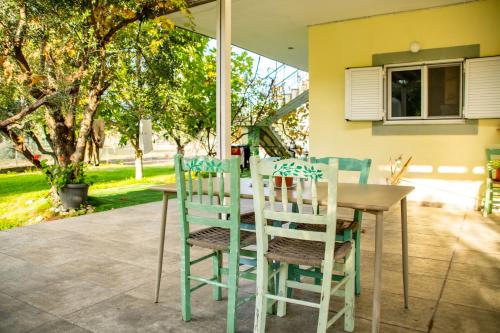 A garden outside Anastasios Olive Garden Apartments