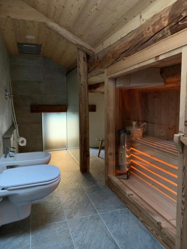 Katil atau katil-katil dalam bilik di Flora Alpina apartments-Residenza Verdebjo