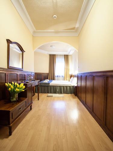 Cama o camas de una habitación en Hotel Kresowianka