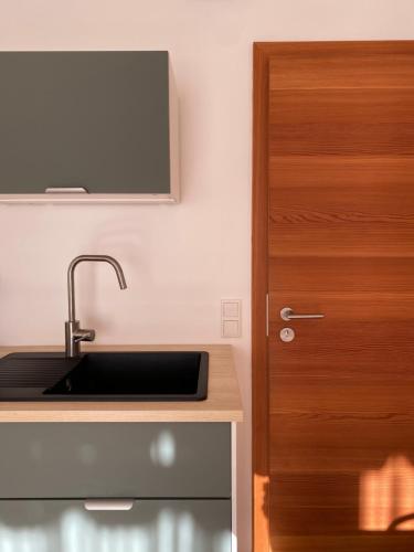 Η κουζίνα ή μικρή κουζίνα στο Seehof Apartments
