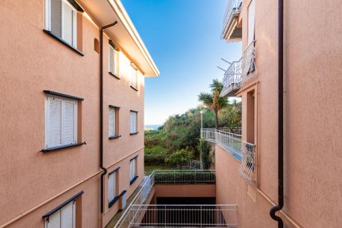 Balkón nebo terasa v ubytování 086 - Sunshine Home, 5 minuti dalla spiaggia - PARCHEGGIO PRIVATO GRATIS INCLUSO