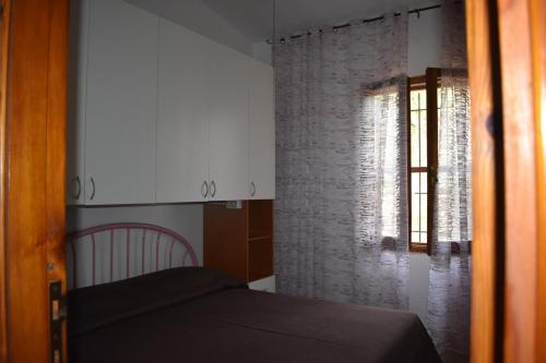 Кровать или кровати в номере Casa Vigna Laterale e Centrale