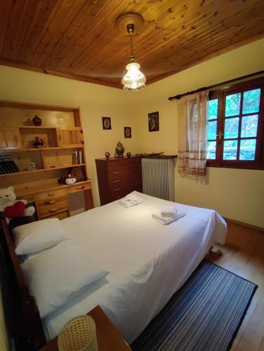 Posteľ alebo postele v izbe v ubytovaní Lagadia Apartments