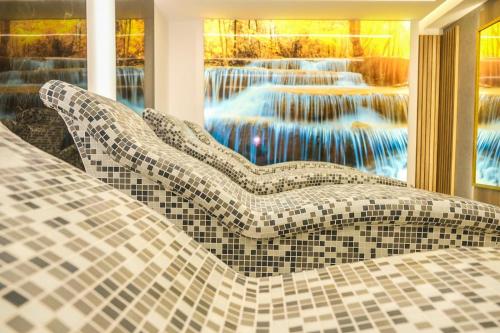 Posto letto in camera con cascata. di President Kop S9, S3 & A102 a Kopaonik