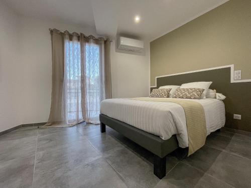 Posteľ alebo postele v izbe v ubytovaní Villa L'Alba BASTIA by Location-tourisme-corse