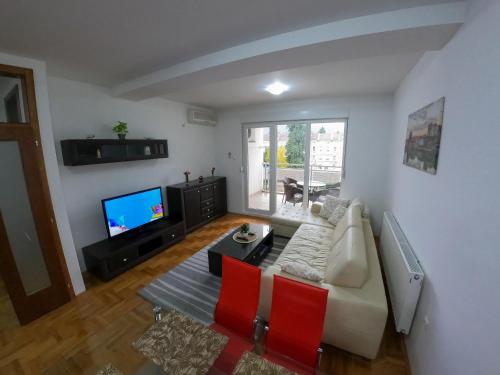 Телевизор и/или развлекательный центр в Apartman City Center AN Trebinje