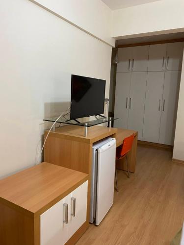 Μια τηλεόραση ή/και κέντρο ψυχαγωγίας στο Líber Hotel Nova Serrana - Conforto na Rota da BR-262