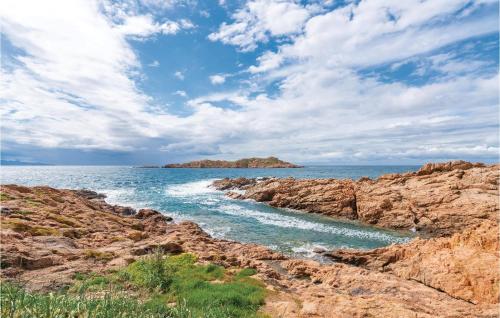 a view of the ocean from a rocky beach at Trilo Sup in Trinità d'Agultu e Vignola