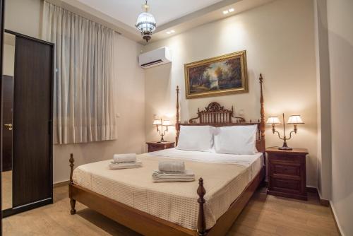 Postel nebo postele na pokoji v ubytování Royal Apartment