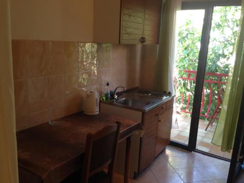 Kuchyň nebo kuchyňský kout v ubytování Apartments Ana Trogir