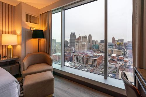 a hotel room with a view of a city at Hollywood Casino at Greektown in Detroit