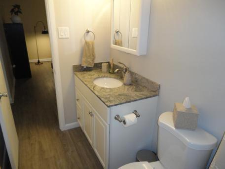a bathroom with a sink and a toilet at Richard Arms Unit 15 in Cocoa Beach