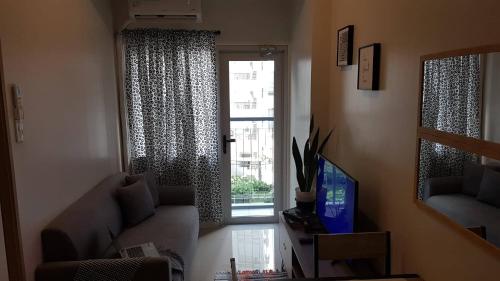 Μια τηλεόραση ή/και κέντρο ψυχαγωγίας στο Maki House Condo