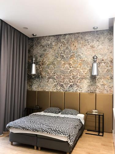 Cama o camas de una habitación en Absynt Hostel Wrocław