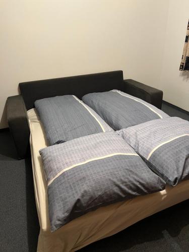 Cama ou camas em um quarto em Komplette Wohnung in Wendelstein bei Nürnberg - Messenähe