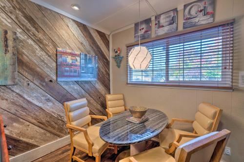 a dining room with a table and chairs at Luxurious Downtown Lodi Apartment in Wine Country! in Lodi