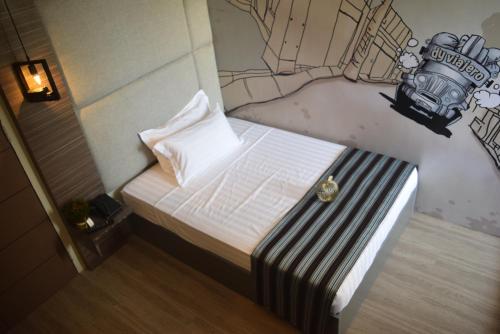 Dy Viajero Transient Hotelにあるベッド