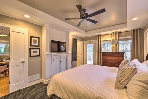 a bedroom with a bed and a ceiling fan at Luxe Lyndon Home Less Than 11 Mi to Dtwn Louisville! in Louisville