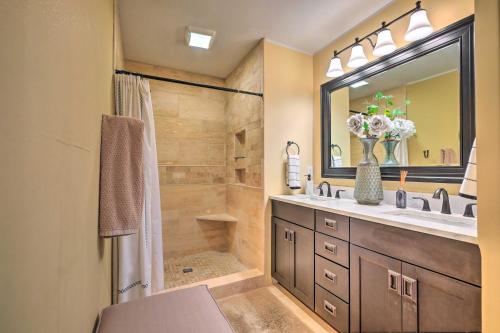 a bathroom with a shower and a sink and a mirror at Luxe Lyndon Home Less Than 11 Mi to Dtwn Louisville! in Louisville