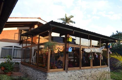 a building with a lot of windows at Dai Nonni Hotel in Guatemala