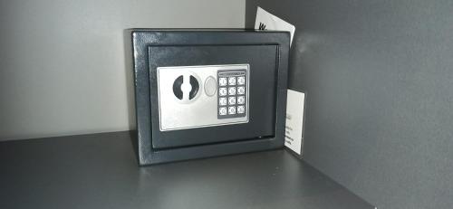 a black and white picture of a pay phone at Apartman Ema, Blizu Gondole Brzeće - Kopaonik in Brzeće