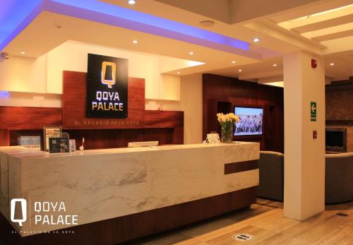 a lobby with a reception desk in a building at Hotel Qoya Palace - Machupicchu in Machu Picchu