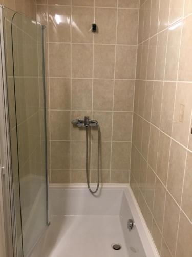 Kúpeľňa v ubytovaní Kincsem Apartman