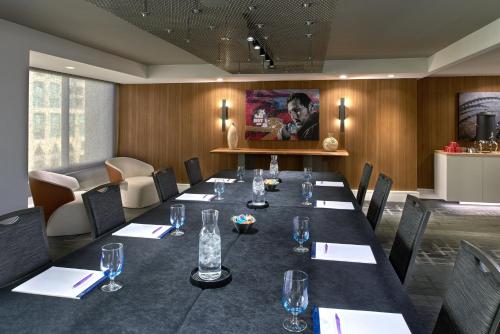 a conference room with a long table and chairs at Kimpton Hotel Palomar Los Angeles Beverly Hills by IHG in Los Angeles