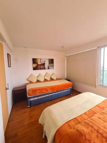 En eller flere senge i et værelse på Gran casa en Totoralillo con vista al mar y más!