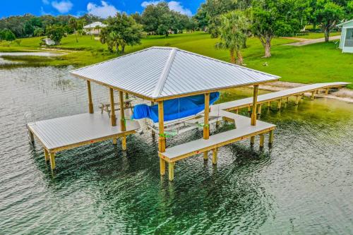 an overhead view of a pavilion in the water at Uncork and Unwind You are on Lake Time in Sebring