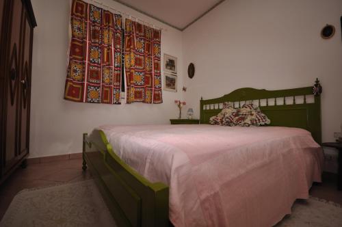 Katil atau katil-katil dalam bilik di Villa Ridente Maria