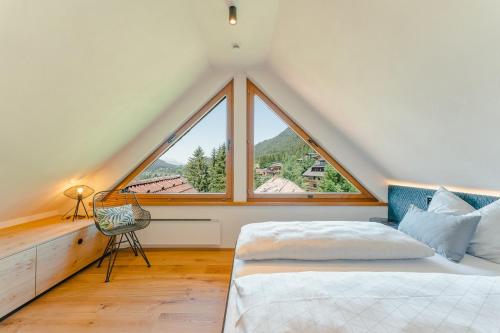 Postel nebo postele na pokoji v ubytování Ferienhaus Holzer