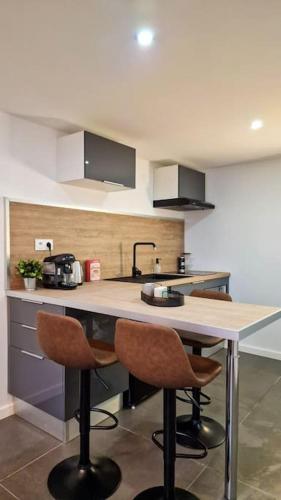 Kuchyňa alebo kuchynka v ubytovaní L’atelier C magnifique Loft avec terrasse privée