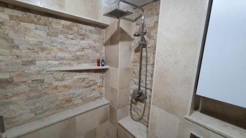 Vannas istaba naktsmītnē TOMIS Studio 4B