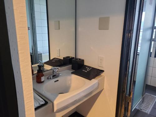 Salle de bains dans l'établissement LC Goryokaku Hotel