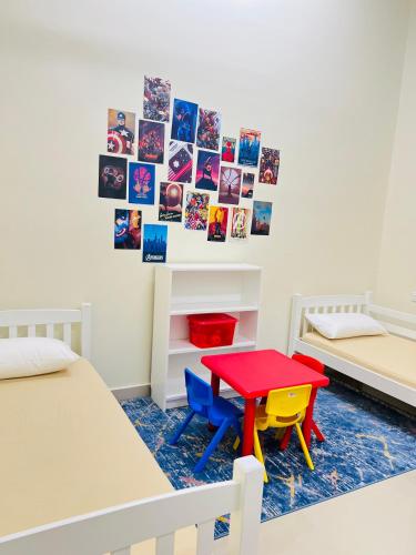 Postel nebo postele na pokoji v ubytování Abu Rakan Apartment