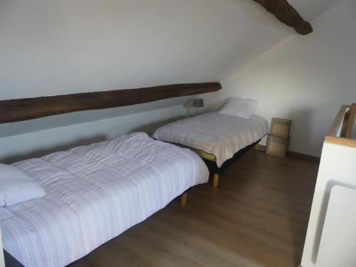 Postel nebo postele na pokoji v ubytování La Belle Aventure
