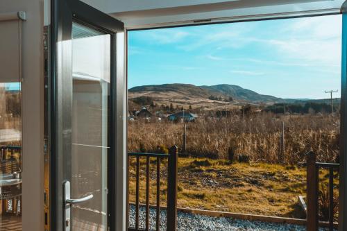 a view from the window of a house at Broadford Lodges Skye in Broadford
