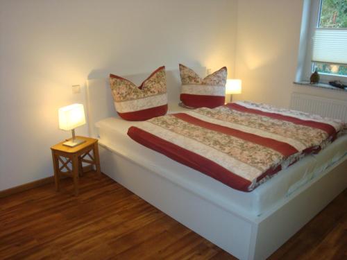 Кровать или кровати в номере Ferienwohnung Stübgen